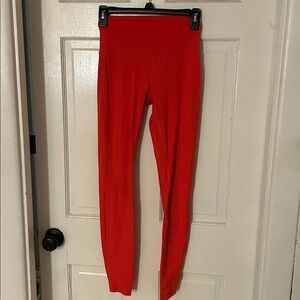 Lululemon Aligns size 4
Bright red
Excellent used condition- no rips or threads